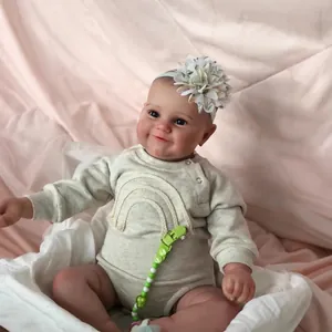 50cm lifelike reborn baby doll Maddie with 3D skin and veins in beige rainbow romper