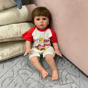 Lifelike 60cm reborn boy doll with realistic 3D skin and cute blue eyes in hippo romper
