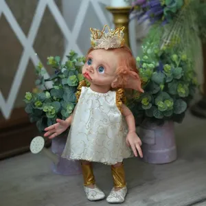 Handmade 16-inch elf reborn doll with red hair, blue eyes and white gold dress