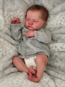 Detailed realistic skin texture and sleep posture of a 19-inch lifelike reborn baby doll