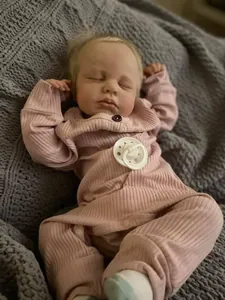 Macro detail of 49cm reborn doll LOULOU showing 3D skin veins and realistic newborn features