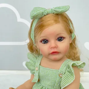 Lifelike 55cm reborn baby doll with blonde curly hair and green plaid dress with headband