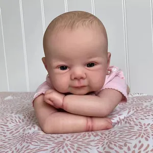 Realistic 19 inch reborn Juliette baby doll with lifelike skin details in pink floral top