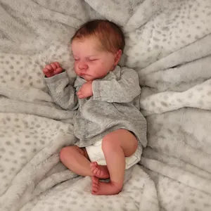 Lifelike 19-inch sleeping Levi reborn baby doll with realistic skin and gray knit outfit