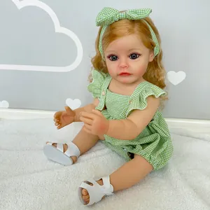 55cm lifelike reborn baby doll SueSue wearing green checkered dress and matching headband