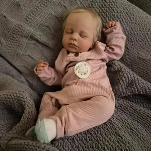 Realistic 49cm Loulou reborn baby doll with 3D skin and visible veins in sleeping pose