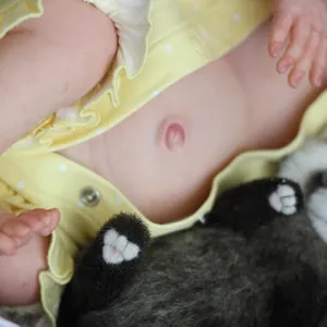Handmade 49cm Reborn Doll with detailed 3D skin texture and yellow polka dot outfit