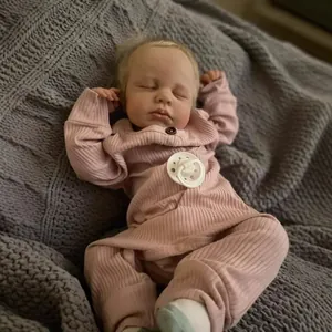 Realistic 49cm Loulou reborn doll with 3D skin and veins in pink ribbed romper