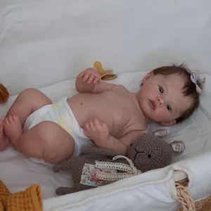 Realistic 49cm reborn baby doll with 3D skin veins in a white woven basket