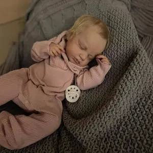 Realistic 49cm reborn baby doll LouLou with 3D skin texture and pink knit hooded outfit