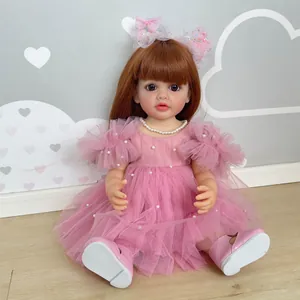 55cm lifelike rebirth doll Betty in pink lace dress with pearls and red-brown hair