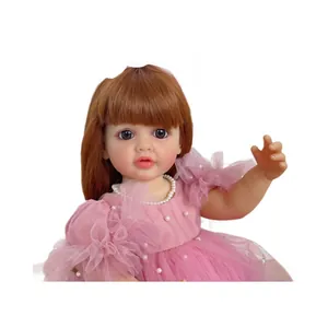 55cm lifelike reborn baby doll Betty with brown hair and a pink mesh princess dress