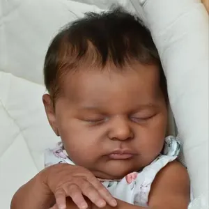 20-inch realistic reborn baby doll with 3d skin veins and hand-rooted hair in floral outfit