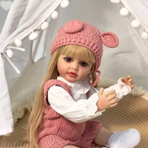 Ρεαλιστική κούκλα μωρό reborn Betty 55cm με ξανθά μαλλιά και ροζ πλεκτό σύνολο