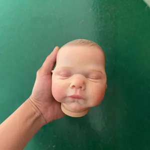 Detailed 19-inch reborn doll head with realistic hand-painted sleeping features