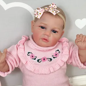 50cm lifelike reborn doll with hand-painted hair and pink floral knit sweater