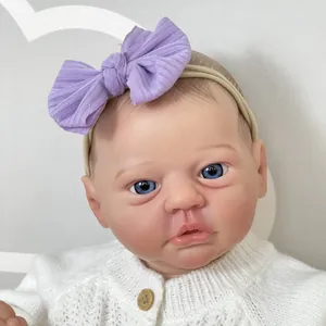 50cm lifelike reborn baby doll with blue eyes and cream knitted cardigan sweater