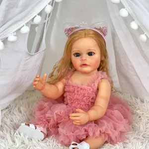 55cm realistic reborn baby doll with blonde hair wearing a pink sequin cat ear headband
