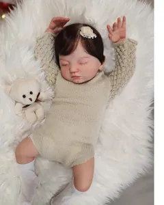 Realistic sleeping reborn baby doll with 3D hand-painted skin and knit romper