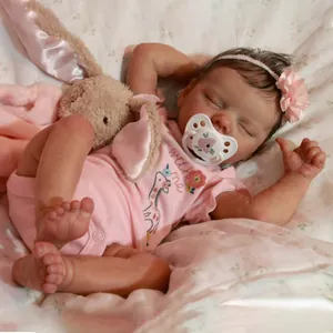 Muñeca bebé reborn realista de 45 cm durmiendo con conejo de peluche y chupete floral