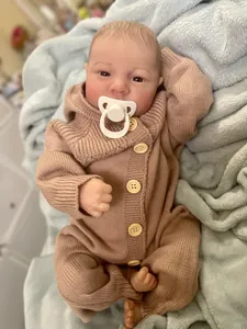 Detailed close-up of 49cm Reborn Levi baby doll face with realistic 3D skin and hand-painted hair