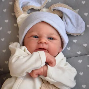 Poupée bébé reborn réaliste 49cm avec peau naturelle et bonnet à oreilles de lapin