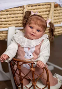 Macro detail of the 60cm Maddie reborn doll showing realistic skin texture and blue eyes