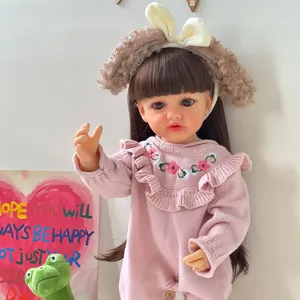 Lifelike 55cm reborn baby doll Betty in pink knit romper with rabbit ear headband