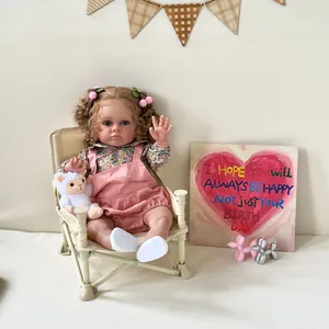 Poupée Reborn Réaliste Bambin Silicone Vinyle Corps en Tissu Veines Peintes à la Main Nouveau-né Fille Réaliste Avec Tenue Florale et Peluche