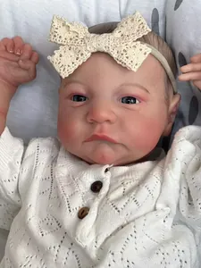 Close-up of 49cm Reborn Doll Levi Awake with visible 3D skin veins and lace headband