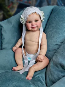 Close-up of realistic newborn Reborn Doll with skin texture and white lace headband