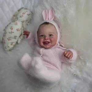 Poupée Bébé Reborn Réaliste Tête Membres en Silicone Souple Corps en Tissu Jouet Fait Main Avec Tenue en Tricot Lapin Rose