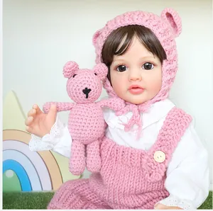 Lifelike 55cm Reborn baby doll Betty with pink knitted outfit and crochet bear toy