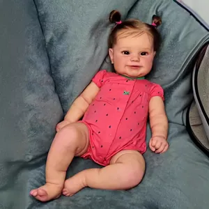 50cm lifelike reborn baby girl doll Maddie in pink watermelon outfit with brown pigtails