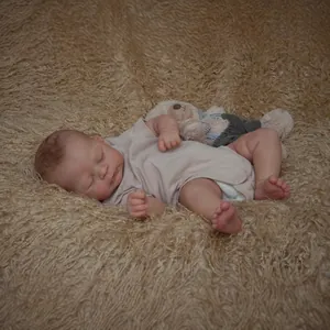 Realistic 49cm reborn baby doll with 3D skin veins sleeping with a small plush bear