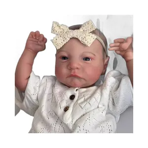 Realistic 49cm Levi Awake reborn doll with 3D skin texture and white knit outfit