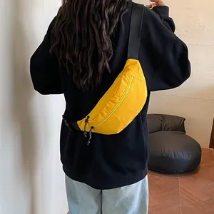 Fashionable yellow nylon crescent crossbody bag with adjustable wide strap for women