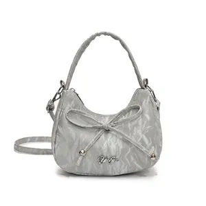 Gray marble textured hobo bag with a bow detail and woven handle for women