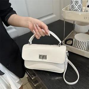 Women Minimalist PU Leather Small Square Handbag Fashion Crossbody Shoulder Bag Silver Rotary Lock Top Handle Tote Bag