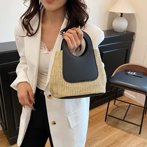 Retro straw tote bag with black leather patchwork for summer travel and daily use