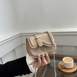 Women Minimalist PU Leather Saddle Bag Fashion Wave Flap Crossbody Bag With Silver Metal Chain Strap Chic Daily Shoulder Bag