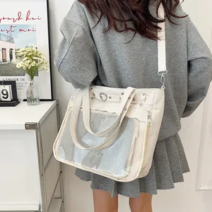 Off-white Ita bag tote with transparent window and adjustable strap shown on model