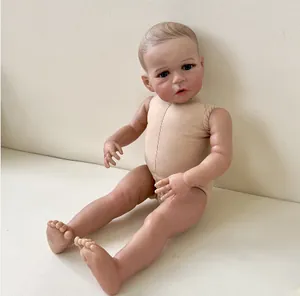 Close-up of a 60cm lifelike reborn toddler doll with blonde hair and blue eyes