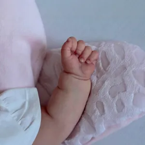50cm lifelike reborn baby doll featuring realistic skin folds and detailed tiny hands