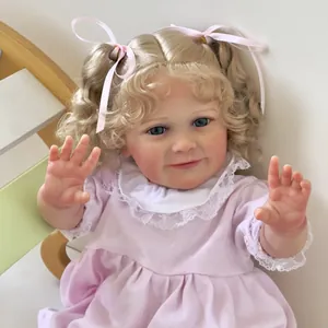 Realistic 55cm reborn baby doll Zoe with curly blonde hair and pink lace dress