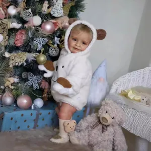 Realistic baby doll Zoe in white fleece hooded romper with cute bear ears and socks