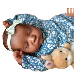 Lifelike 19 inch Reborn baby doll Levi with dark skin in floral romper with bunny toy