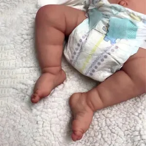 Realistic 49cm reborn baby doll with 3D skin texture and visible veins in diaper