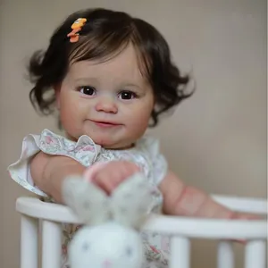 Poupée Reborn Bébé Fille Réaliste Membres en Silicone Souple Corps en Tissu Cheveux Bruns Robe Florale Jouet Fait Main