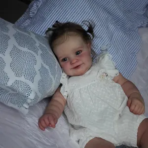 Realistic 60cm baby girl doll Maddie in white lace dress and cute brown pigtails